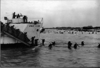 9th Canadian Infantry Brigade disembark landing craft at Bernières-sur-Mer.