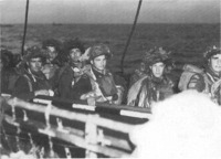 Troops of the Régiment de la Chaudière, 8th Brigade, prepare to board LCA's.