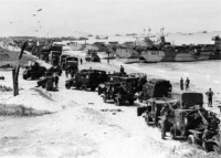 Allied forces equipment come ashore.